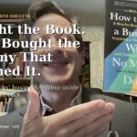 Anthony Raymond holding The IW$ Guide to How to Buy a Business With No Money Down for the article I Bought the Book Then I Bought the Company That Published It