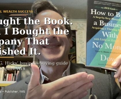 Anthony Raymond holding The IW$ Guide to How to Buy a Business With No Money Down for the article I Bought the Book Then I Bought the Company That Published It